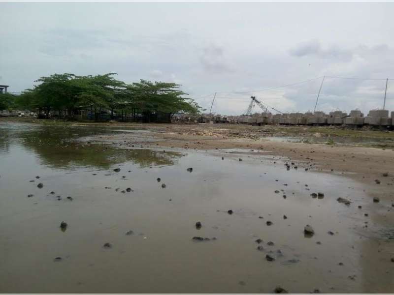 Perbaikan Jembatan Bendung Gerak Terkendala Lumpur Sisa Banjir