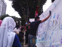 Aksi Seribu Cap Tangan oleh HMI BojonegoroTolak Korupsi