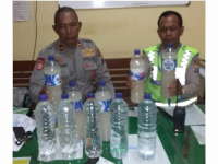 Polsek Kota Amankan 10 Botol Miras Jenis Tuak dan Arak