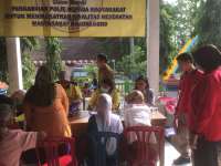 Polres Bojonegoro Adakan Pengobatan Massal di Negeri Atas Angin Kecamatan Sekar