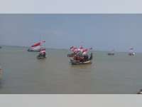 Kirab Satu Negeri, Kibarkan Bendera Merah Putih di Pantai Tuban